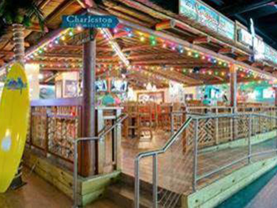 Tiki Bar Din Interior with wooden chairs and tables